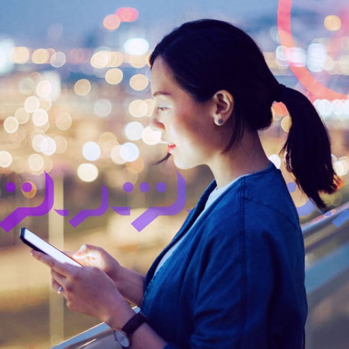 Image of woman, holding cell phone, facing to the left. This is used to illustrate Vonage Opt-Out Assist.